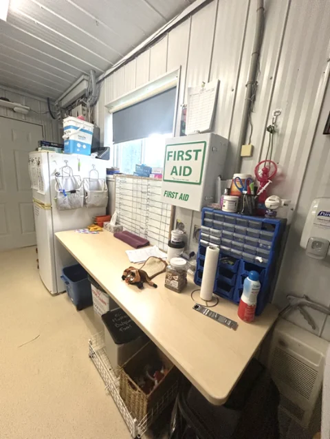 The makeshift first-aid bench where NHS vet techs provide care