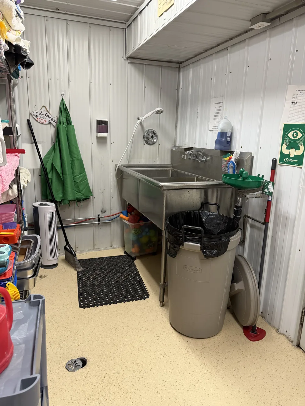 The cramped wash room at NHS's current shelter, where every animal dish is washed by hand in a single steel sink